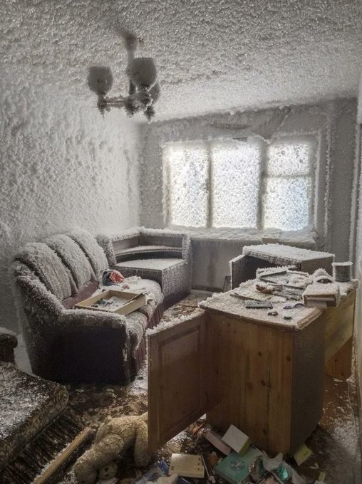 23. Ice crystals cover the interior of an abandoned apartment north of the Arctic Circle in Russia